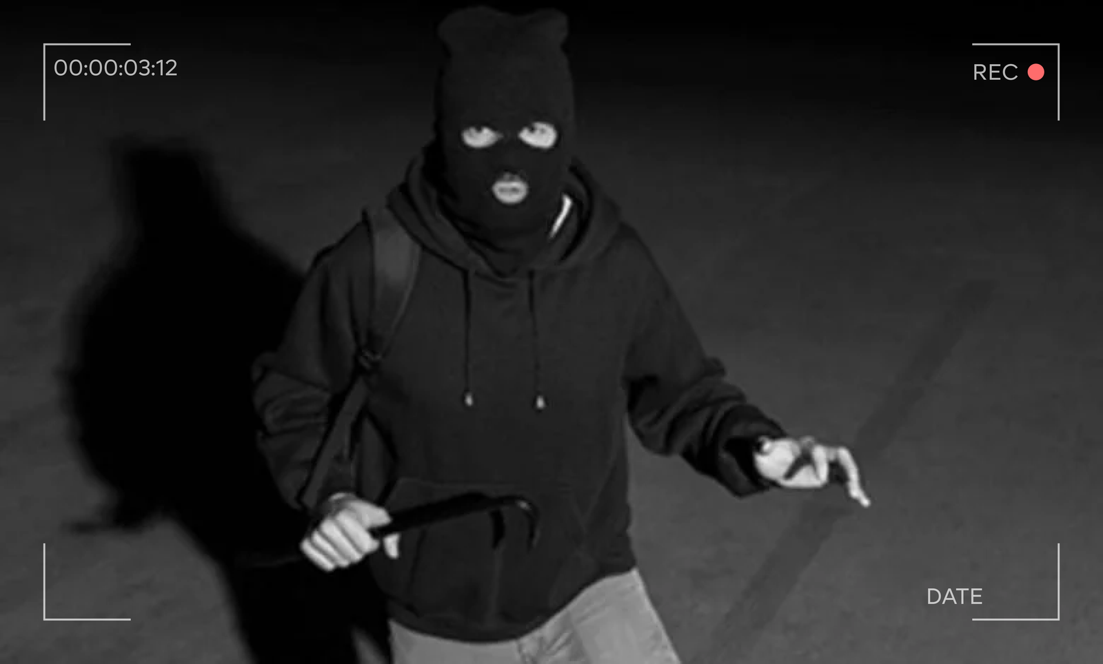 Night-vision camera feed detecting a person on site