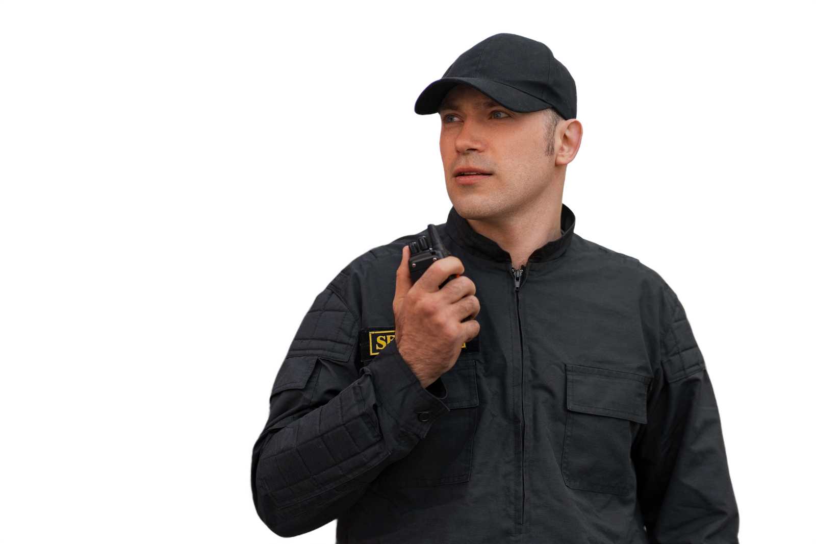 IONIC security operator monitoring a job site with a two-way radio